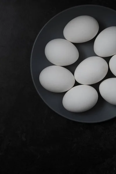 Chicken eggs on a plate — Stock Photo, Image