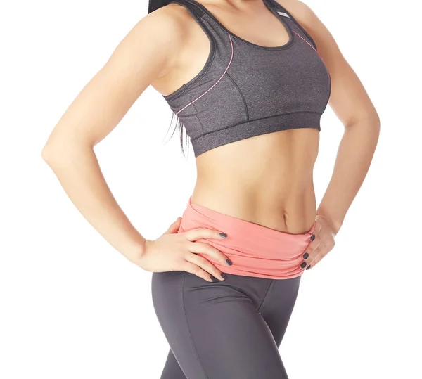 Fitness woman posing on a white background — Stock Photo, Image