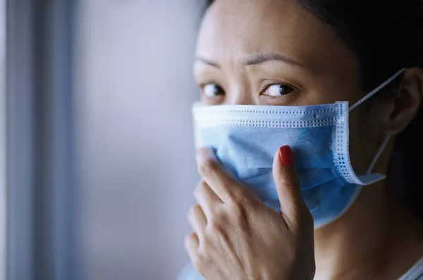 Woman Staying Home Wearing Protective Surgical Mask — Stock Photo, Image