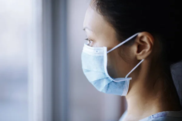 Woman Staying Home Wearing Protective Surgical Mask — Stock Photo, Image