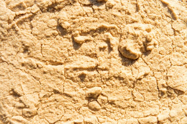 Желтый пляжный песок — стоковое фото