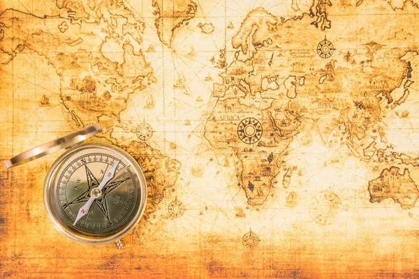 Old map with an ancient compass — Stock Photo, Image