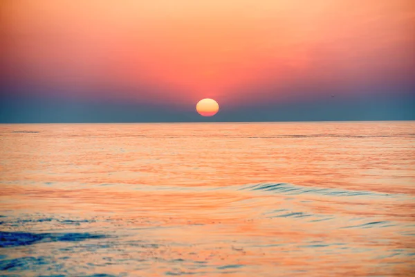 Sunset or sunrise over sea — Stock Photo, Image