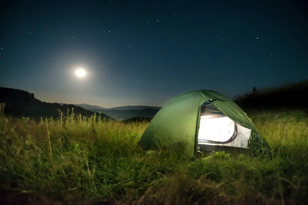 Green tent in mountains — Stock Photo, Image