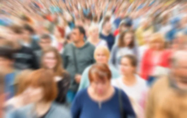 Blurred crowd of people — Stock Photo, Image