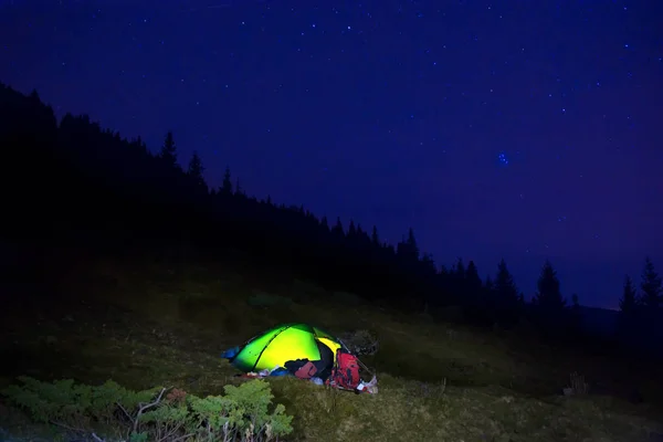 Illuminated orange camping tent — Stock Photo, Image