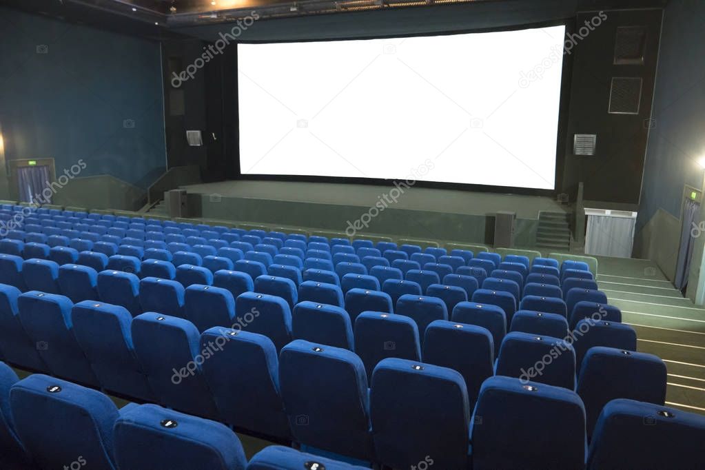 Empty movie cinema with raws of blue seats