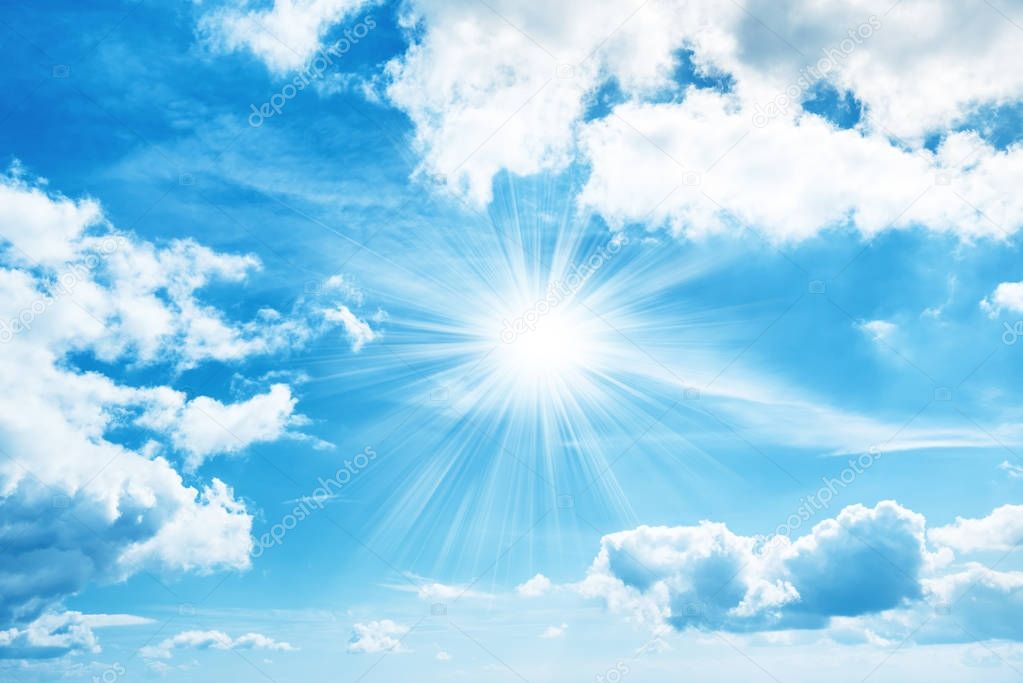 Sun on blue sky with white clouds, nature background