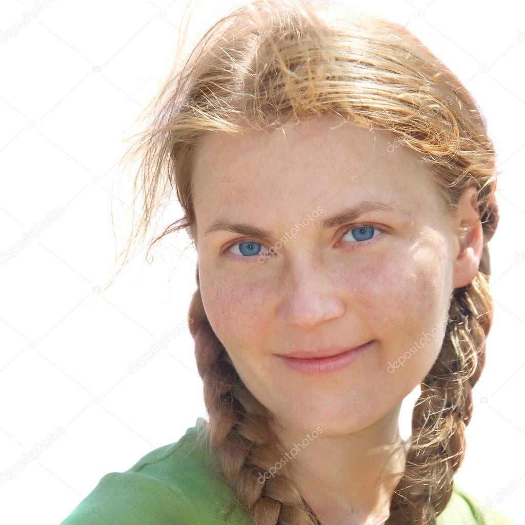 Portrait of woman with pigtails, red hair and freckles isolated on white background