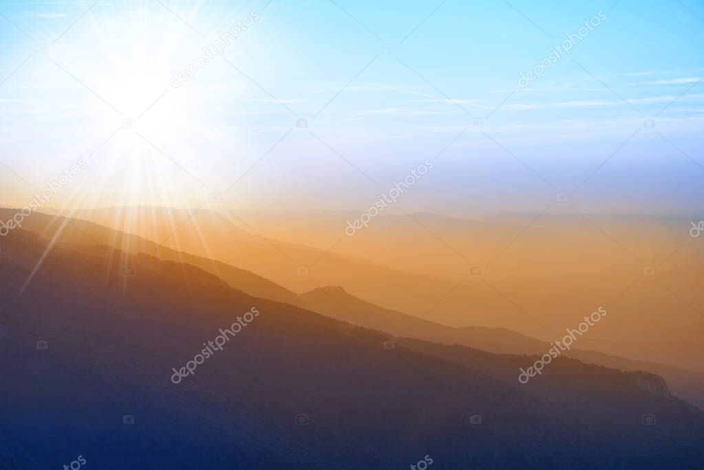 view of mountains on sunset background