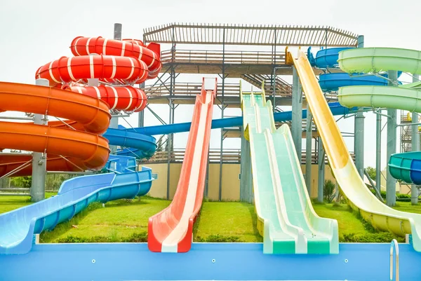 Aqua park constructions with big slides and pipe