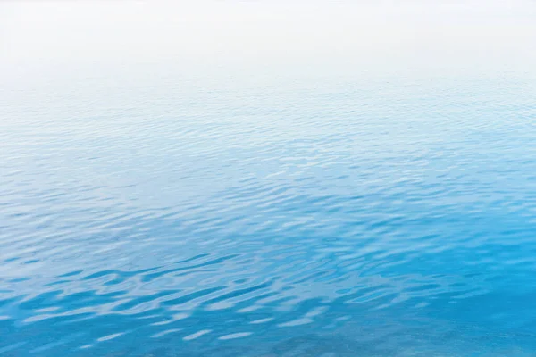 Blauw water abstracte achtergrond — Stockfoto
