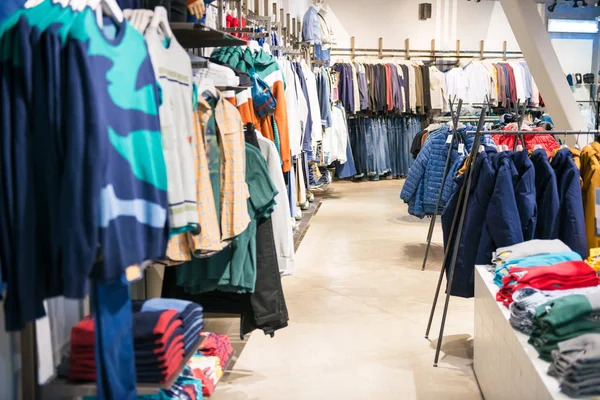 Clothes section interior in market shop and supermarket