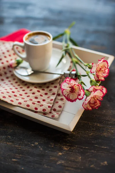 Coffee and carnation — Stock Photo, Image
