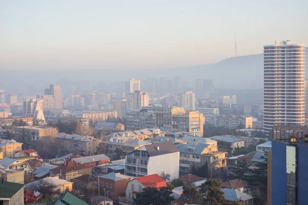 Pôr do sol sobre o novo centro da cidade de Tbilisi — Fotografia de Stock