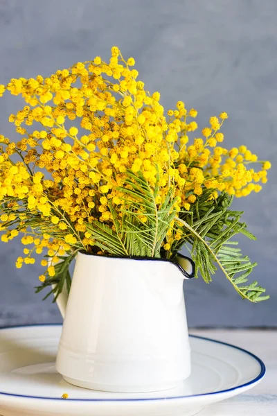 Spring table setting with mimosa flowers — Stock Photo, Image