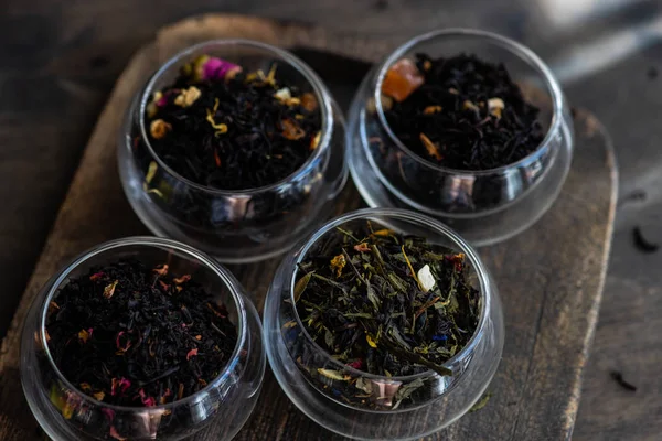 Tea varieties on wooden background — Stock Photo, Image