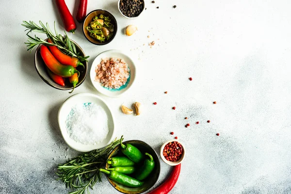 stock image Organic food frame with spices and vegetables on stone background with copy space