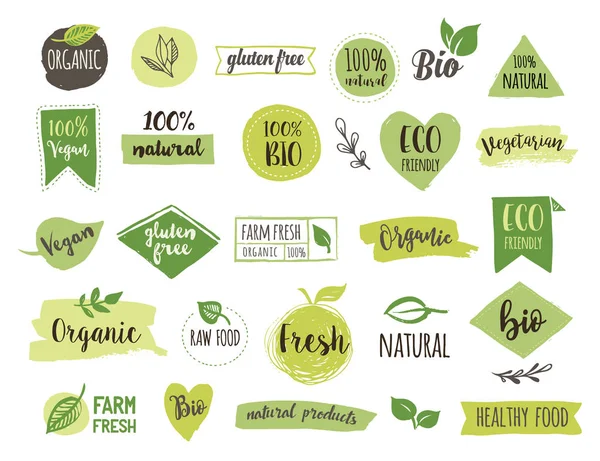 Bio, Écologie, Logos et icônes organiques, étiquettes, étiquettes. Badges bio dessinés à la main pour aliments sains, ensemble de signes alimentaires crus, végétaliens, sains, biologiques et d'éléments — Image vectorielle