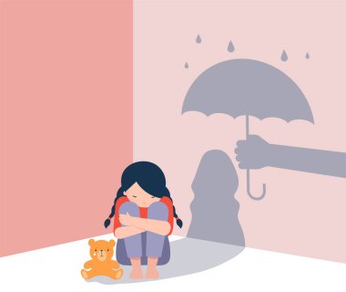 Sad little girl with teddy bear sitting on floor, shadow on the wall is a hand with umbrella protects her. Child abuse, violence against children concept design. 