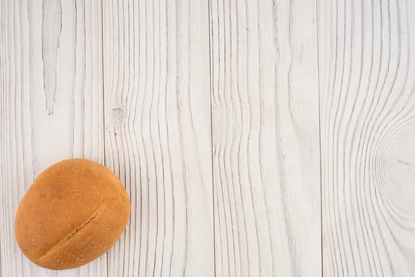 Hamburger buns on white old wooden table. — Stock Photo, Image