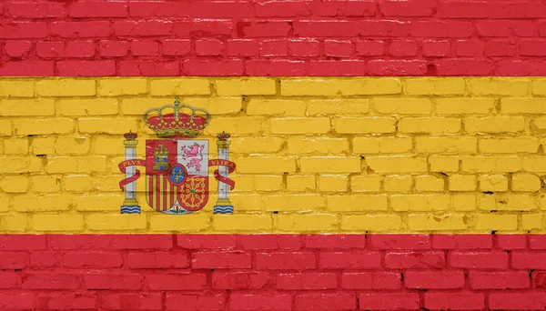 Bandeira da Espanha, bandeira espanhola pintada na parede de tijolos — Fotografia de Stock