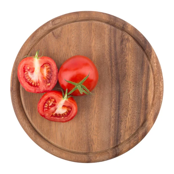 Posiekane pomidory na deska do krojenia. — Zdjęcie stockowe