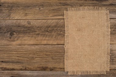 Eski çuval bezi ve ahşap doku. 