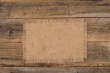 Eski çuval bezi ve ahşap doku. 