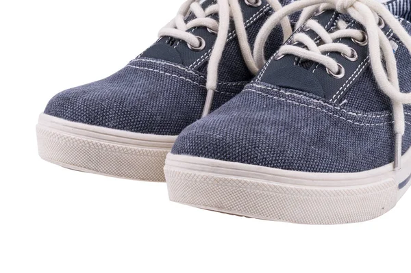 Imagen de un par de zapatillas azules sobre un fondo blanco. —  Fotos de Stock