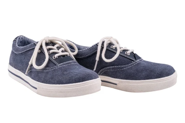 Photo d'une paire de baskets bleues sur fond blanc. — Photo