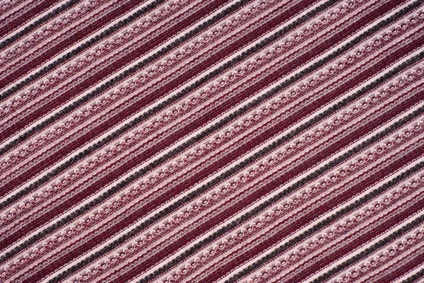 Fundo de uma matéria têxtil de malha com padrão diagonal . — Fotografia de Stock