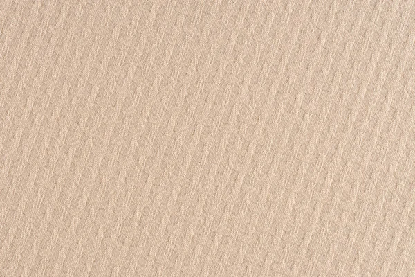 Крупным планом шерстяной ткани бежевого цвета . — стоковое фото