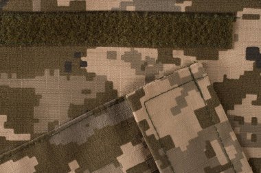 Kumaş kamuflaj deseni cepli. Yelek parçası. Abstra