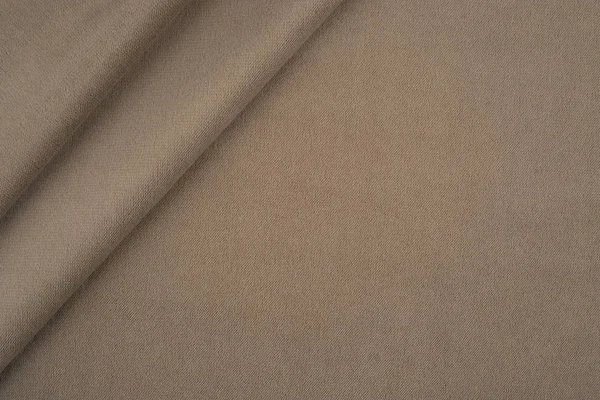 Verliezen van een wollen stof beige kleur. Abstracte achtergrond — Stockfoto