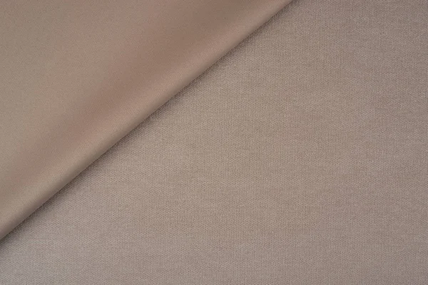Κοντινό πλάνο της ένα μάλλινο ύφασμα μπεζ χρώμα. Αφηρημένα φόντο, — Φωτογραφία Αρχείου