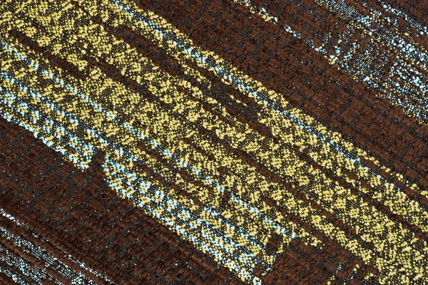 Arka plan için kahverengi, yeşil, mavi kumaş dokusu.