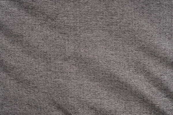 Nahaufnahme eines Wollgewebes von grauer Farbe. Abstrakter Hintergrund, — Stockfoto