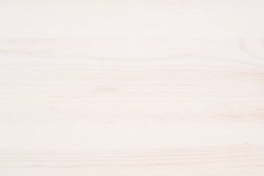 Arkaplan olarak beyaz yumuşak tahta yüzey. 