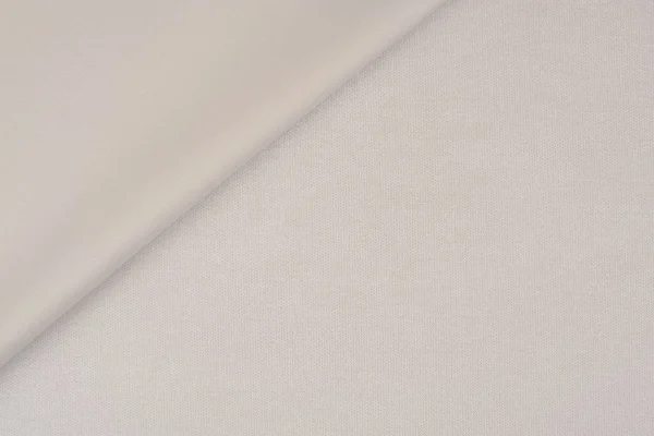 Close up van een wollen weefsel van beige kleur. Abstracte achtergrond, — Stockfoto