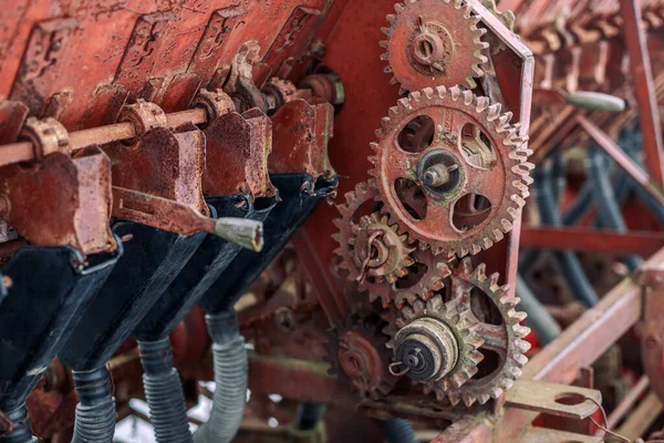 Old rusty farm equipment agricultural combine mechanism Royalty Free Stock Images
