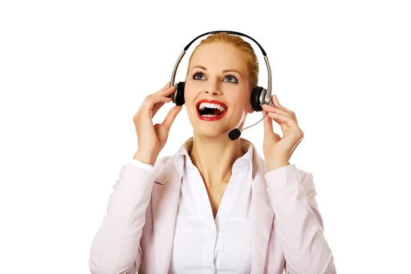 Smiling female phone operator in headphones — Stock Photo, Image