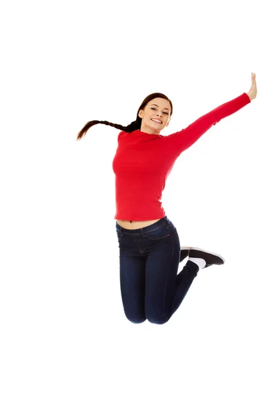 快乐的跳跃的美丽的年轻女子 — 图库照片