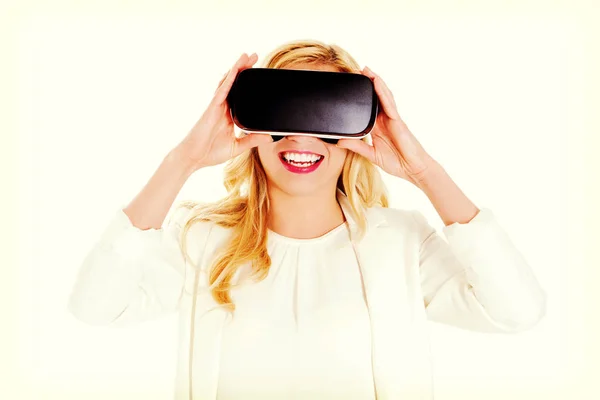 Girl wearing virtual reality goggles isolated on white. — Stock Photo, Image