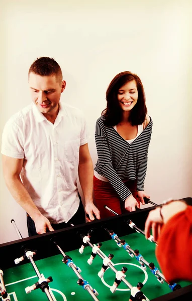 Friends playing table football. — Stock Photo, Image