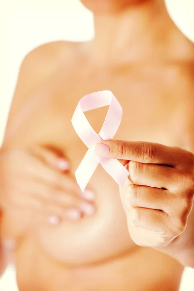 Topless woman with pink breast cancer ribbon. — Stock Photo, Image