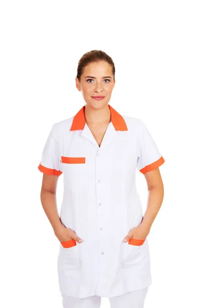 Ungt leende kvinnlig läkare eller sjuksköterska — Stockfoto