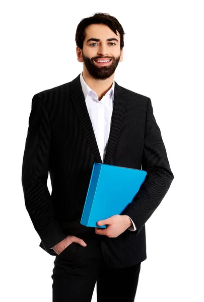 Stilig affärsman holding ett Binder-dokument. — Stockfoto