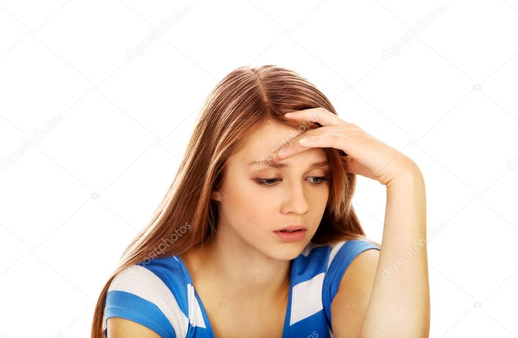 Teenage depression woman sitting on the floor