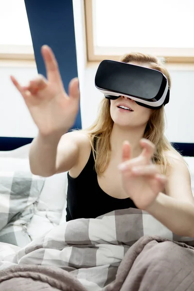 Woman with glasses of virtual reality.